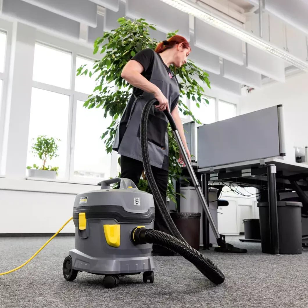 BlueBear Cleaning team member cleaning an office